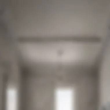 Before and after comparison of a bathroom ceiling paint job