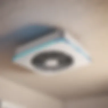 Electrician wiring bathroom fan for installation