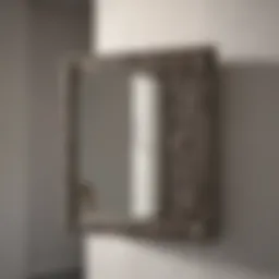 Bathroom mirror with elegant hinge mechanism