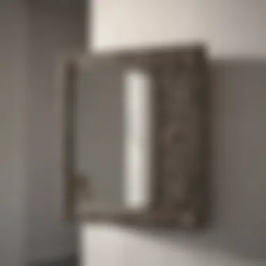 Bathroom mirror with elegant hinge mechanism