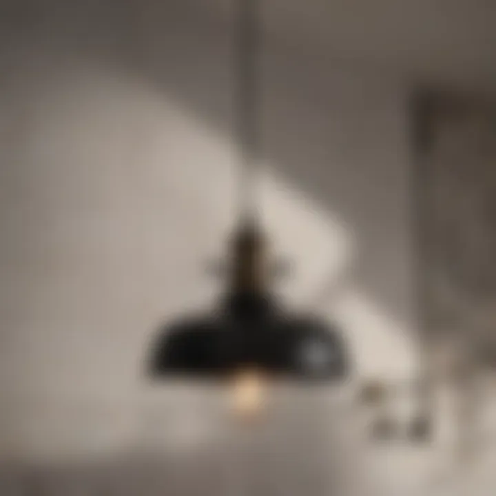 Industrial Pendant Fixture Black industrial pendant light hanging in a contemporary bathroom setting