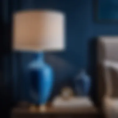Chic bedside table with blue ceramic lamp
