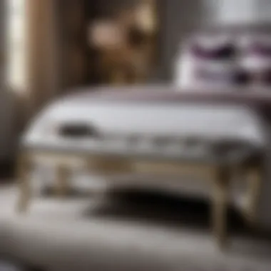 Glamorous Metallic Bench Chic bench at the foot of the bed with metallic accents