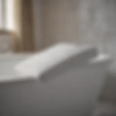 Close-up of a luxurious bath wedge pillow positioned by a bathtub
