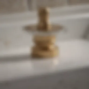 A detailed view of a bathroom sink drain with visible components.