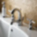 Illustration of various bathroom faucet parts labeled