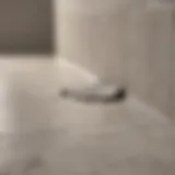 Close-up of freshly applied grout sealant on bathroom tiles