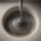 Understanding the Clog Close-up of a clogged sink drain with debris