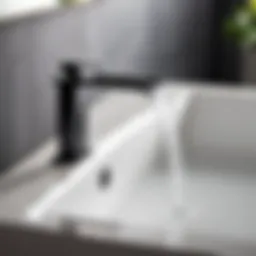 Sleek black waterfall faucet in modern bathroom