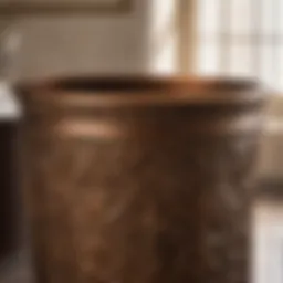 Bronze bathroom wastebasket with intricate detailing