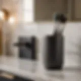 Dark gray toothbrush holder against marble countertop
