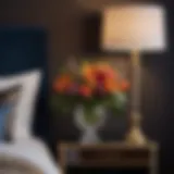 Floral Elegance on Dark Nightstand Dark Nightstand with Floral Arrangement