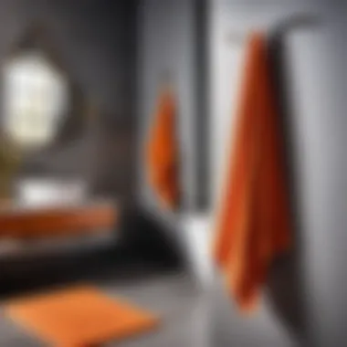 Stylish Geometric Orange Hand Towel Stylish geometric orange hand towel hanging in a contemporary bathroom