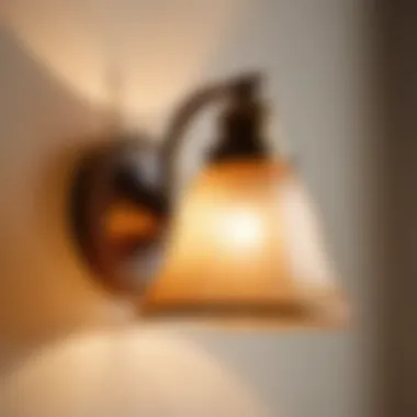 Antique bronze bathroom sconce casting a warm glow