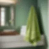 Elegant light green towel hanging in a sophisticated bathroom setting