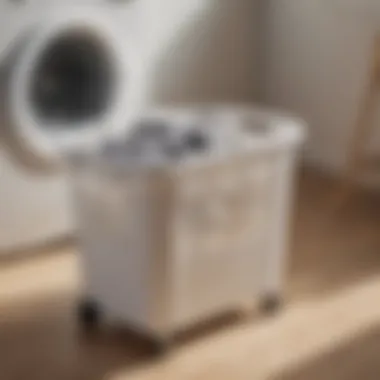 Close-up of the ergonomic handle and wheel mechanism of a plastic laundry basket designed for easy mobility.