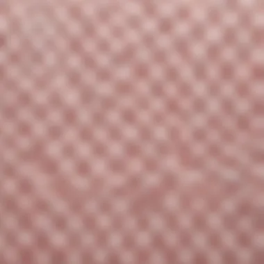 Textural Details of Pink and White Bath Mats Close-up of texture and material of a pink and white bath mat