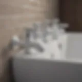 Close-up view of various bathroom PVC pipe fittings showcasing different shapes and sizes.