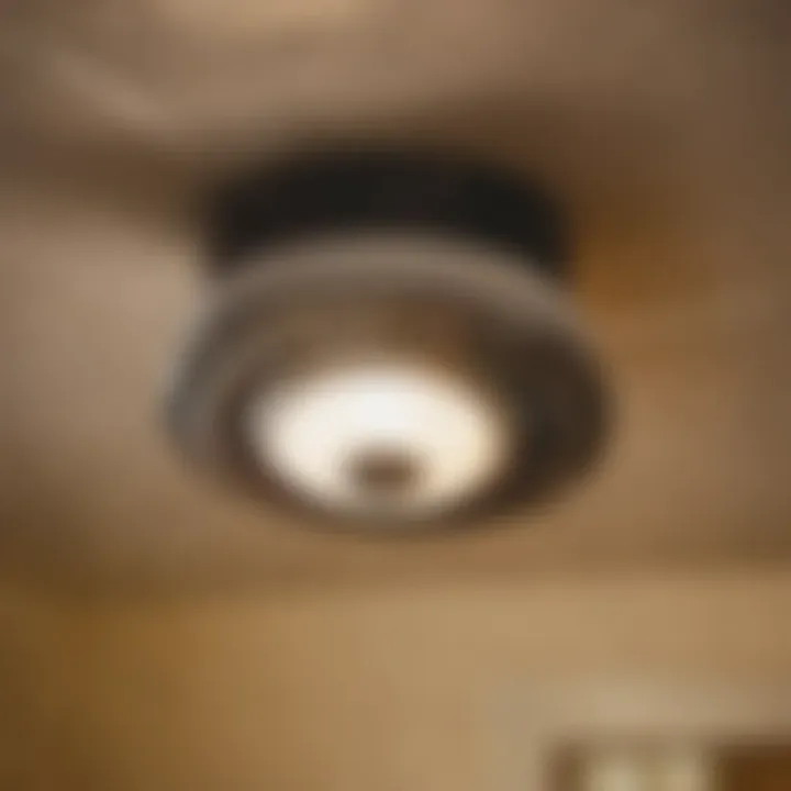 A close-up of a bathroom exhaust fan motor