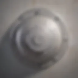 Close-up of a bathroom fan motor showing signs of wear