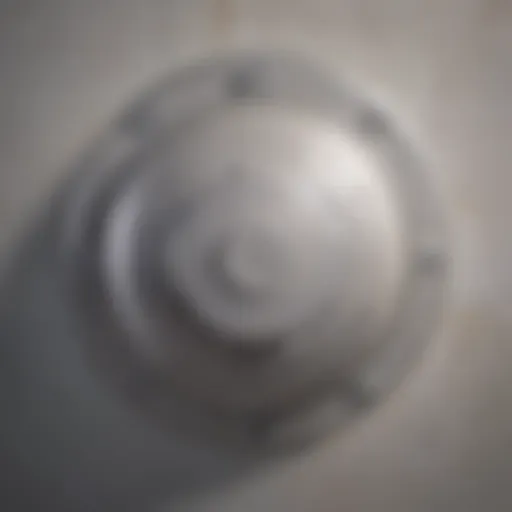 Close-up of a bathroom fan motor showing signs of wear