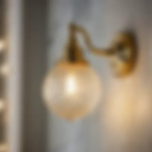 Elegant gold brass bathroom light fixture hanging in a luxurious bathroom