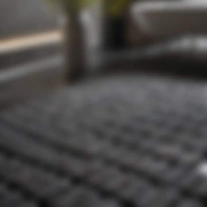 Close-up view of luxurious materials used in dark grey bathroom mats