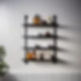 Sleek black metal narrow bathroom shelf against white tiled wall