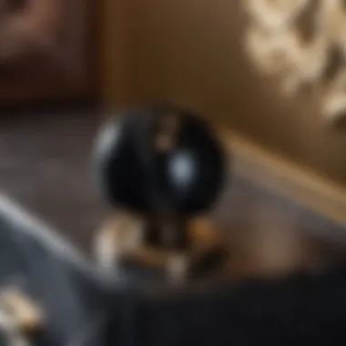 Minimalist black marble knob on modern chest of drawers
