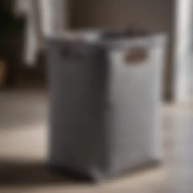 Sleek Grey Collapsible Hamper Minimalist collapsible fabric laundry hamper in sleek grey