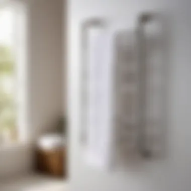 Minimalist white towel rack with folded towels