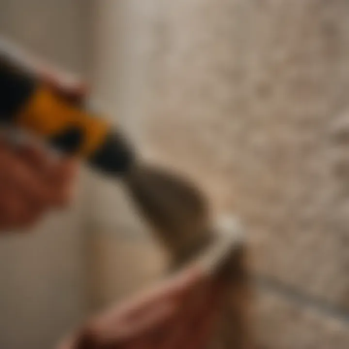 Close-up of new grout being applied with a precision tool