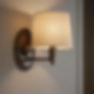 Sleek Wall-Mounted Sconce Sleek wall-mounted sconce enhancing bedroom decor