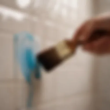 Elegant Brush Technique for Tile Revamp Brush applying paint on outdated bathroom tiles