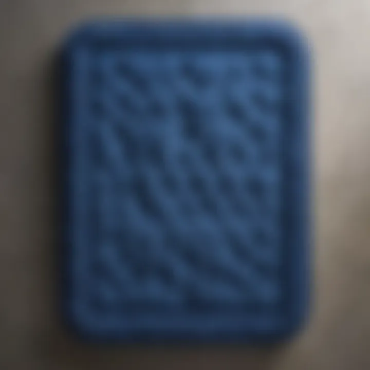 Top view of royal blue memory foam bath mat with exquisite detailing