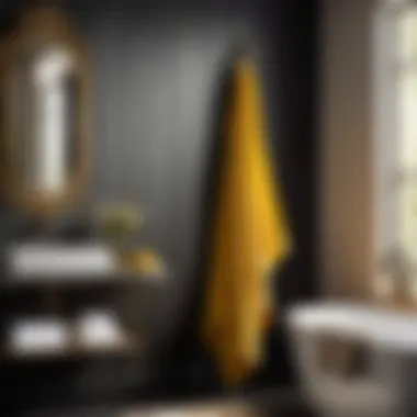 Elegant black and yellow bath towels in bathroom setting