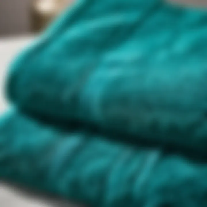 Exquisite Stitching Detail on Teal Blue Bath Towels Up Close Close-up of the intricate stitching detail on teal blue bath towels