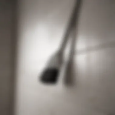 Gentle Brush Application Tile wall cleaning solution being applied with a soft brush