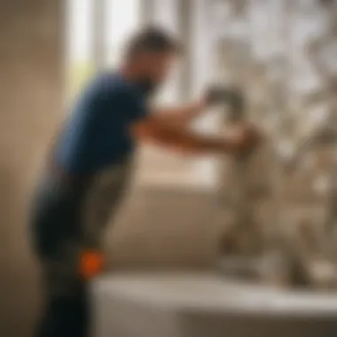 Skilled Tiler Working on Bathroom Renovation Skilled Tiler Working on Bathroom Renovation