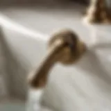 Vintage brass faucet handle with intricate floral design
