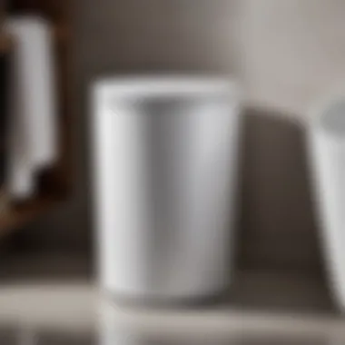 Stylish White Ceramic Trash Can with Functional Lid White Ceramic Trash Can with Lid in Modern Bathroom Setting