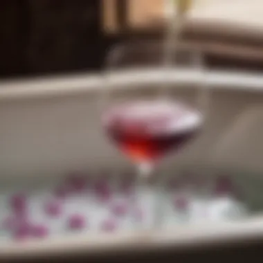 Aromatic indulgence in the bathtub Close-up of wine glass filled with bubbles and bath salts